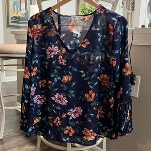 Brand NEW flower print shirt. V neckline